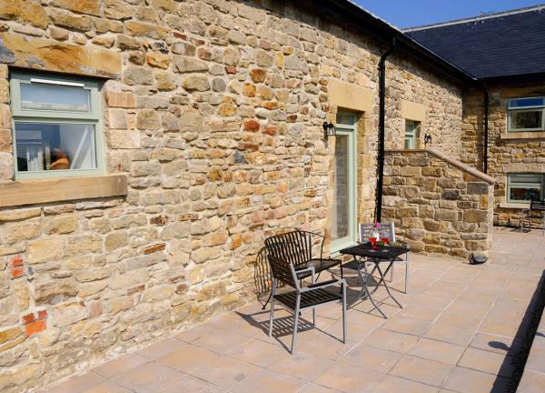 Pig Run Barn 4 Star Gold near Beamish, Durham and Newcastle , enjoys a lovely patio to sit out and enjoy the sun 
