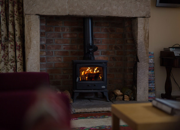 Riding Farm Cottage open plan lounge with wood burning stove 